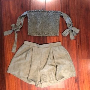 Two piece set. Crop top/shorts. NEVER WORN.